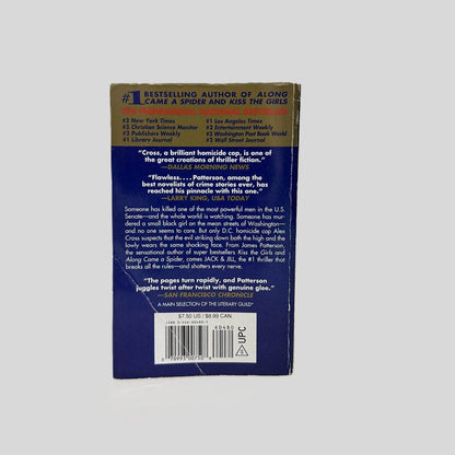 Back cover view of Jack & Jill by James Patterson centered on a neutral light gray background. Creasing on the bottom left corner.