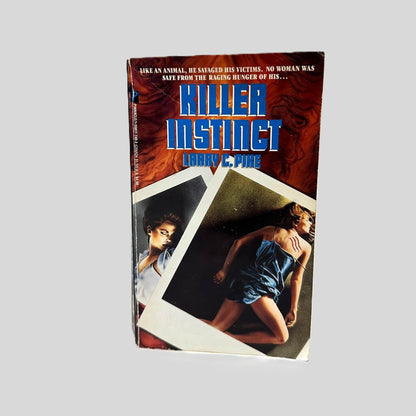 Front cover view of Killer Instinct by Larry C. Pike centered on a neutral light gray background. Minor chipping to edges.