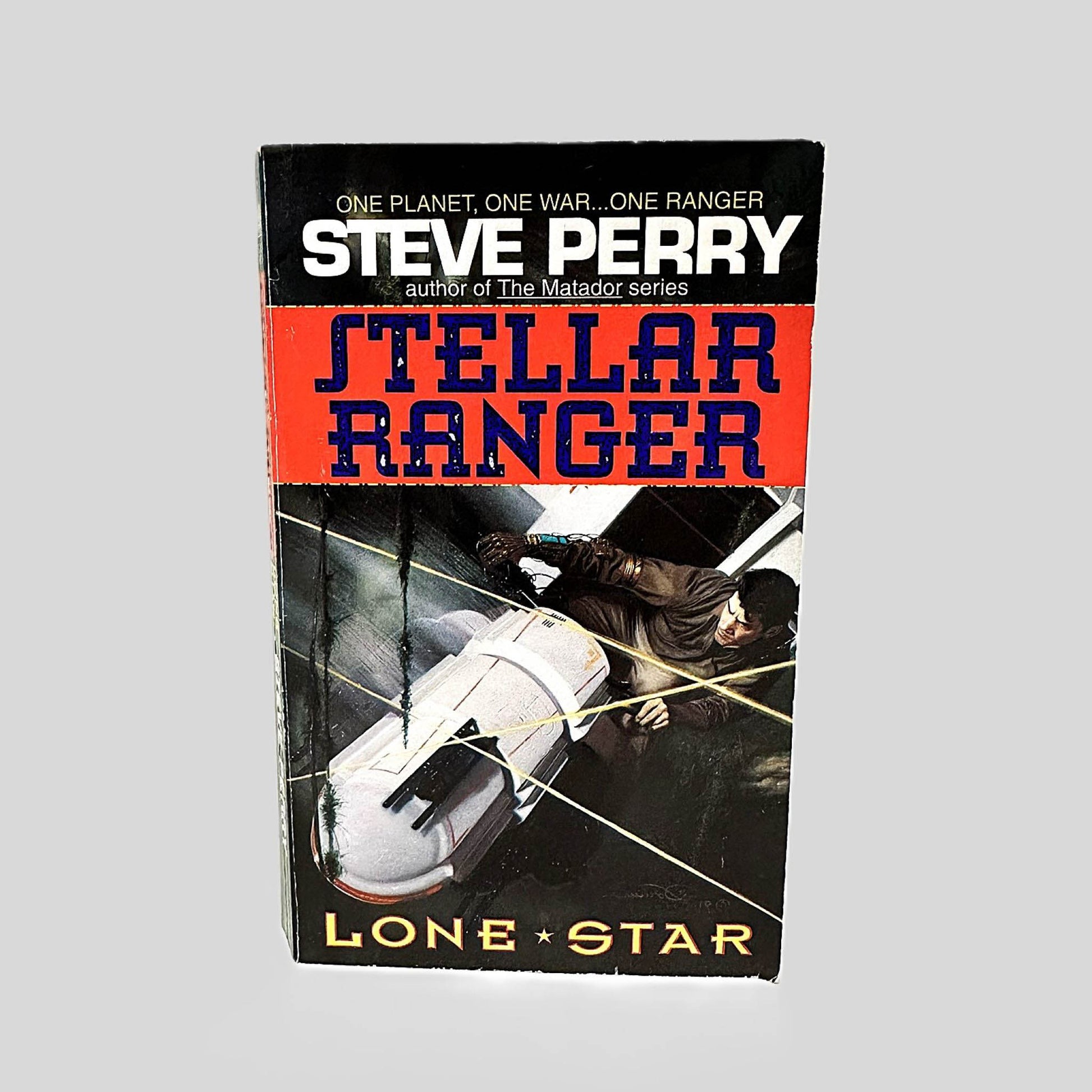 Front cover view of Lone Star by Steve Perry centered on a neutral light gray background. Normal wear around the edges.