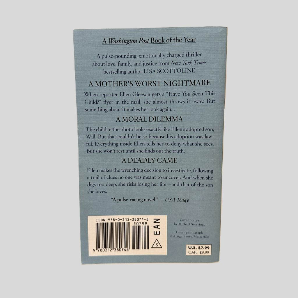 Back cover view of Look Again by Lisa Scottoline centered on a neutral light gray background. 