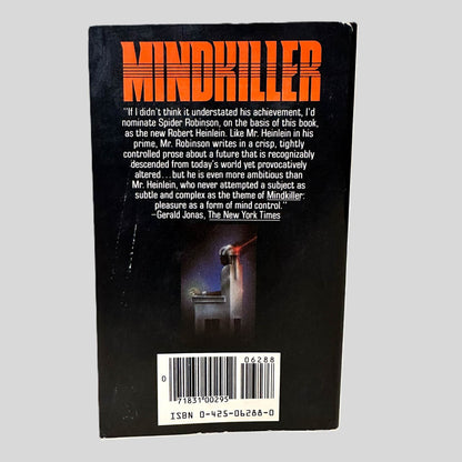 Back cover view of Mindkiller by Spider Robinson centered on a neutral light gray background. Minor chipping around the edges and scuff mark on the left of the back cover.