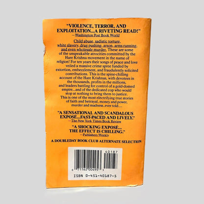 Back cover view of Monkey on a Stick by John Hubner & Lindsey Gruson centered on a neutral light gray background. Back cover shows chipping.