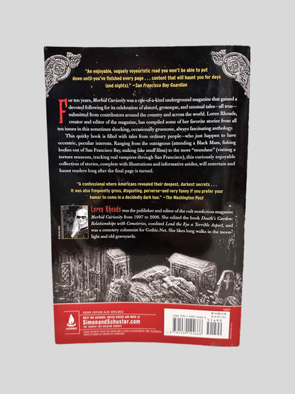 Back cover view of Morbid Curiosity Cures the Blues Edited by Loren Rhoads centered on a neutral light gray background. 