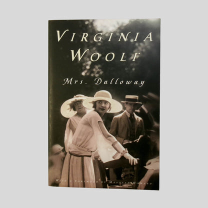Front cover view of Mrs. Dalloway by Virginia Woolf centered on a neutral light gray background. Cover art is vibarns. Some minor rubbing near the spine edge. Not shown - the inside cover has the previous owner's name written in black ink.
