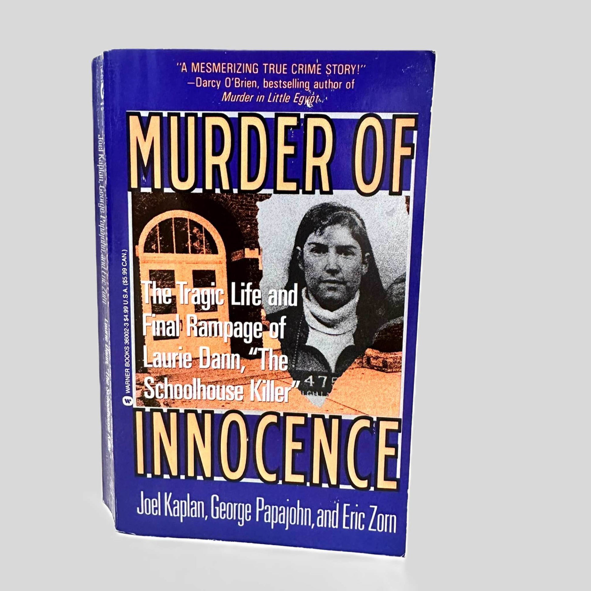 Front cover view of Murder of Innocence by Joel Kaplan, George Papajohn, & Eric Zorn centered on a neutral light gray background. 
