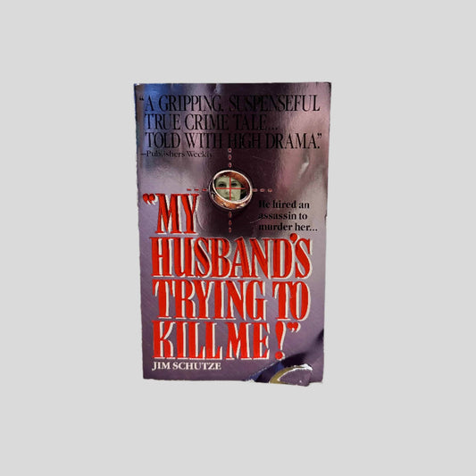 Front cover view of My Husband's Trying to Kill Me! by Jim Schutze centered on a neutral light gray background. 