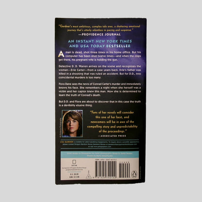 Back cover view of Never Tell by Lisa Gardner centered on a neutral light gray background. 