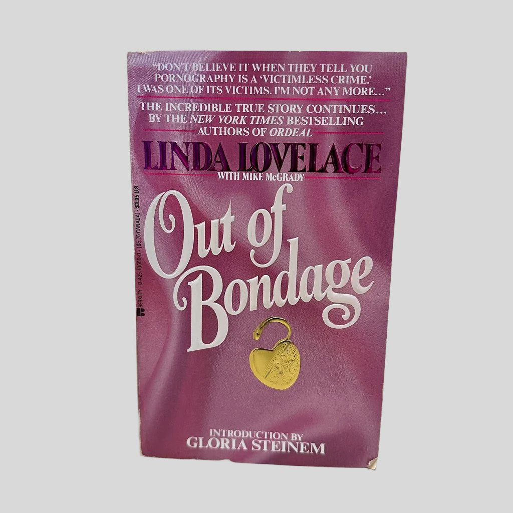 Front cover view of Out of Bondage by Linda Lovelace centered on a neutral light gray background. The cover is a satin textured pink with with white font for the title.