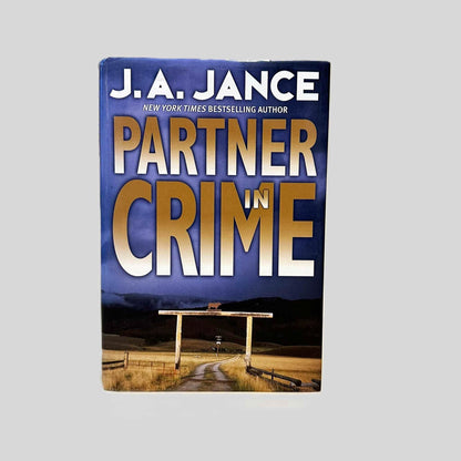Front cover view of Partner in Crime by J.A. Jance centered on a neutral light gray background. Dust jacket is present and undamaged. 