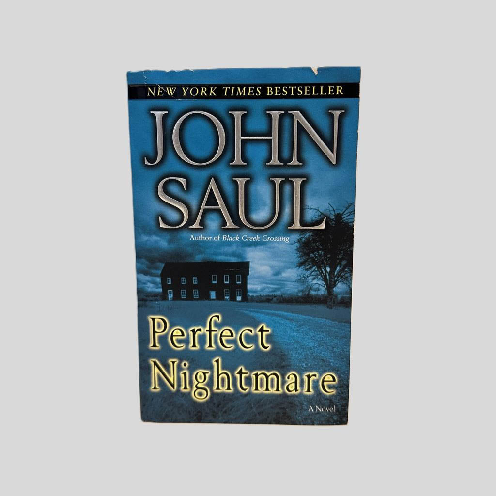 Front cover view of Perfect Nightmare by John Saul centered on a neutral light gray background. Front cover shows chipping along the top.