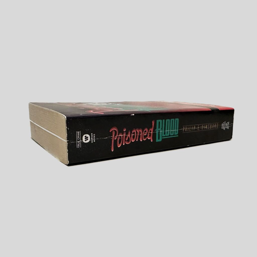 Close-up spine view of Poisoned Blood by Philip Ginsburg centered on a neutral light gray background. Spine is square with minimal creasing.