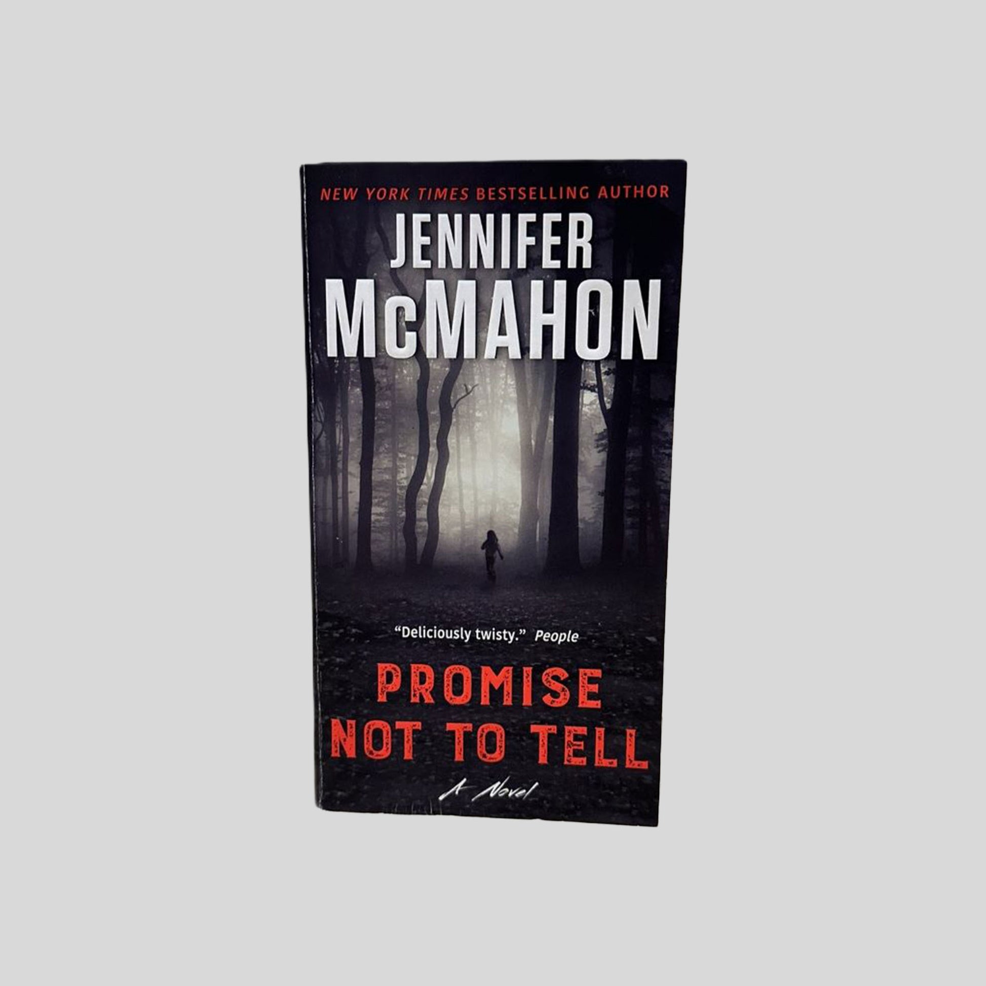 Front cover view of Promise Not To Tell by Jennifer McMahon centered on a neutral light gray background. 