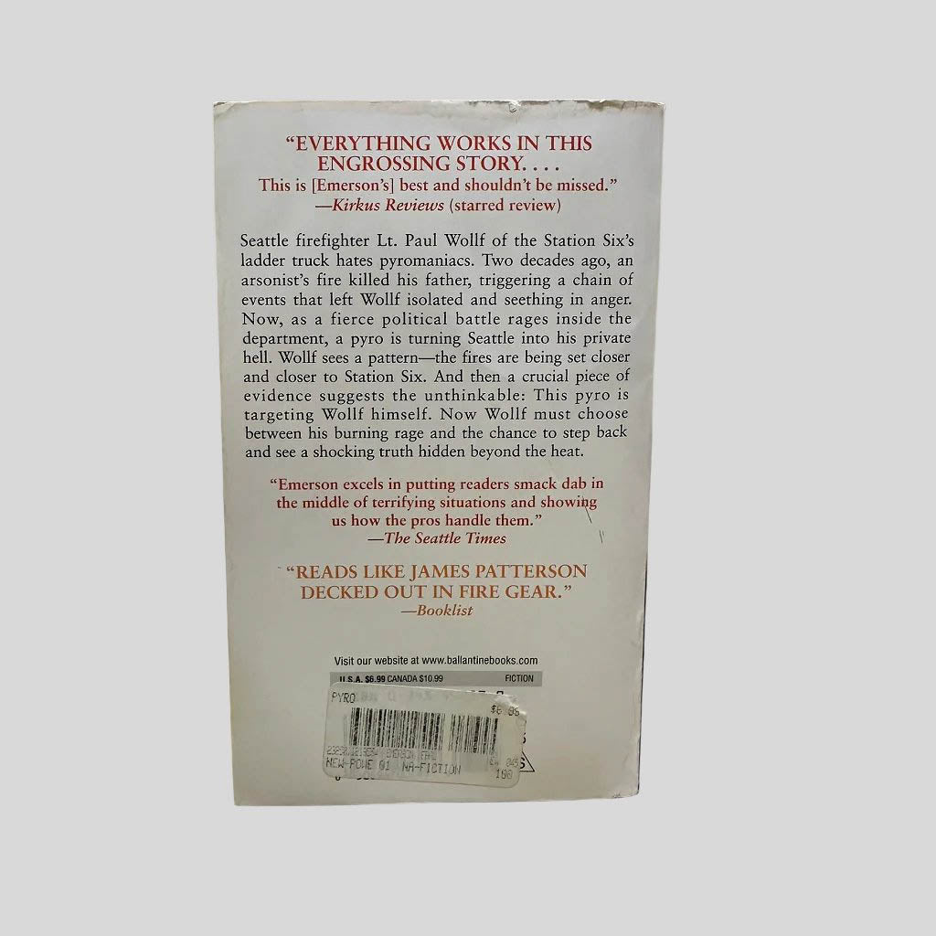 Back cover view of Pyro by Earl Emerson centered on a neutral light gray background.  Top of the back cover has some chipping.