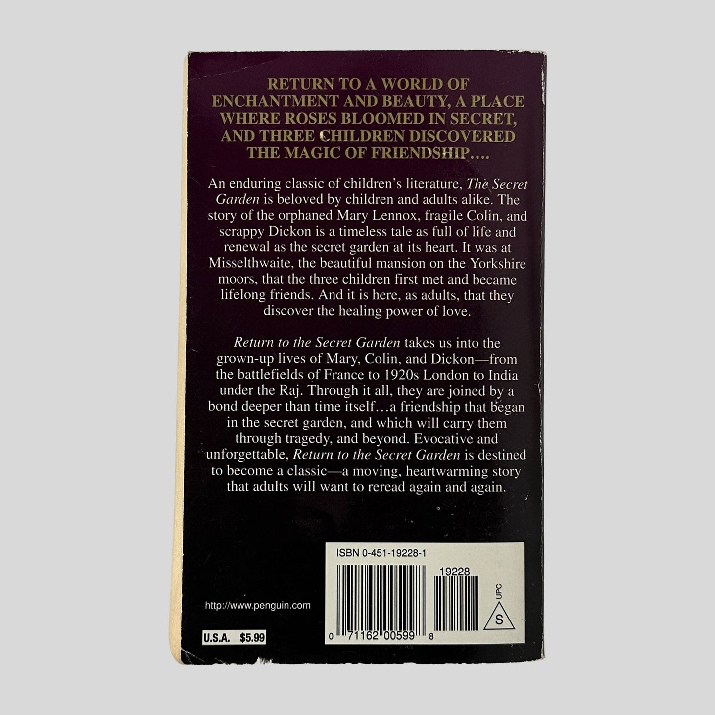 The dark purple back cover of the book, featuring gold and white text that describes the adult lives of Mary, Colin, and Dickon.
