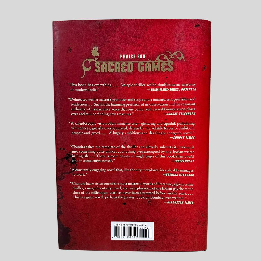 Back cover view of Sacred Games by Vikram Chandra centered on a neutral light gray background. Dust jacket present and undamaged.