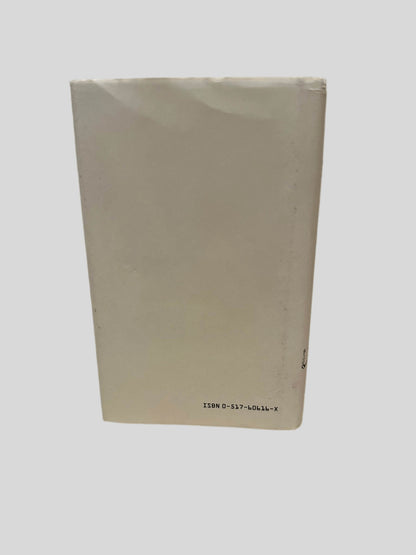 Back cover view of Sherlock Holmes Selected Stories by Sir Arthur Conan Doyle centered on a neutral light gray background. dust jacket is present and shows some creasing to the top edge.