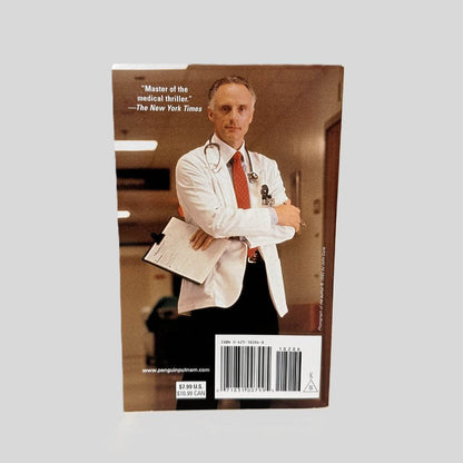 Back cover view of Shock by Robin Cook centered on a neutral light gray background. 