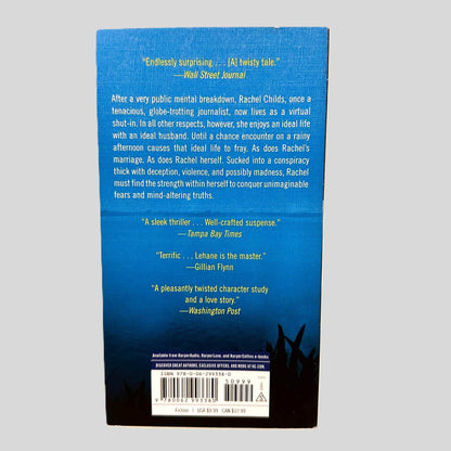Back cover view of Since We Fell by Dennis Lehane centered on a neutral light gray background. 