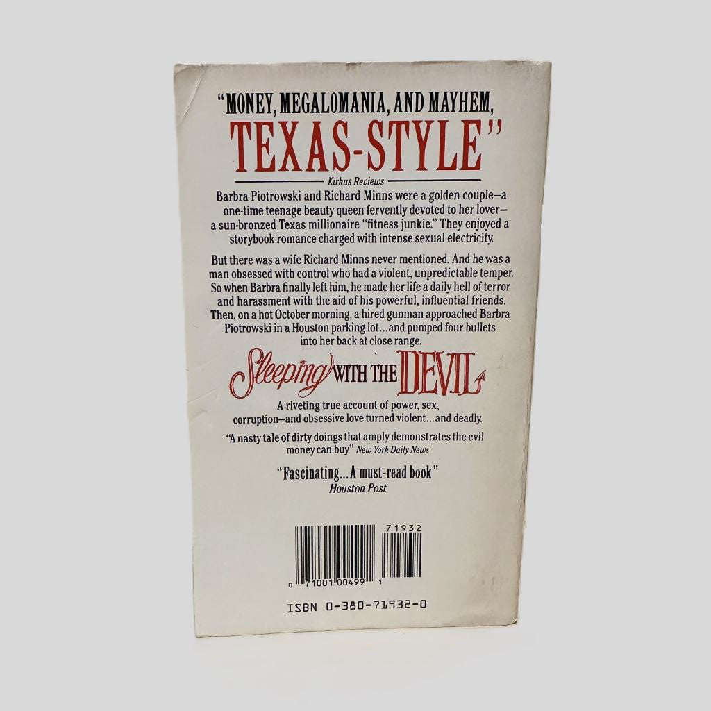 Back cover view of Sleeping with the Devil by Suzanne Finstad centered on a neutral light gray background. 