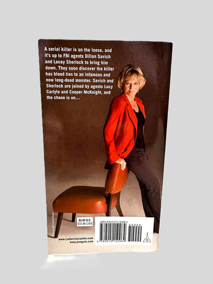 Back cover view of Split Second by Catherine Coulter centered on a neutral light gray background. 