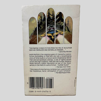 Back cover view of Star Gate by Andre Norton centered on a neutral light gray background. Chipping around edges from normal wear. Cover art is vibrant.