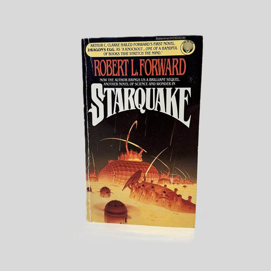 Front cover view of Starquake by Robert L. Forward centered on a neutral light gray background. Creasing present near the spine.