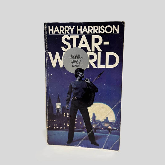 Front cover view of Starworld by Harry Harrison centered on a neutral light gray background. Creasing to the left lower corner and along the spine edge. Cover art is vibrant.