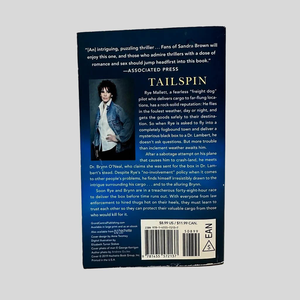 Back cover view of Tailspin by Sandra Brown centered on a neutral light gray background. 