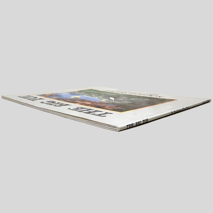 Angle view showing the page edges of The Big Toe by Ellie Kirby centered on a neutral light gray background. 