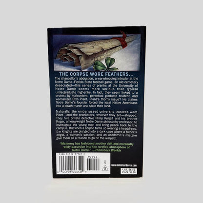 Back cover view of The Book of Kills by Ralph McInerny centered on a neutral light gray background. 