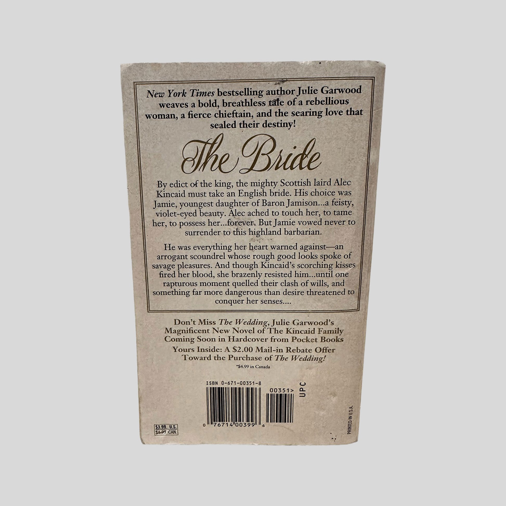 Back cover view of The Bride by Julie Garwood centered on a neutral light gray background. 