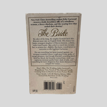 Back cover view of The Bride by Julie Garwood centered on a neutral light gray background. 