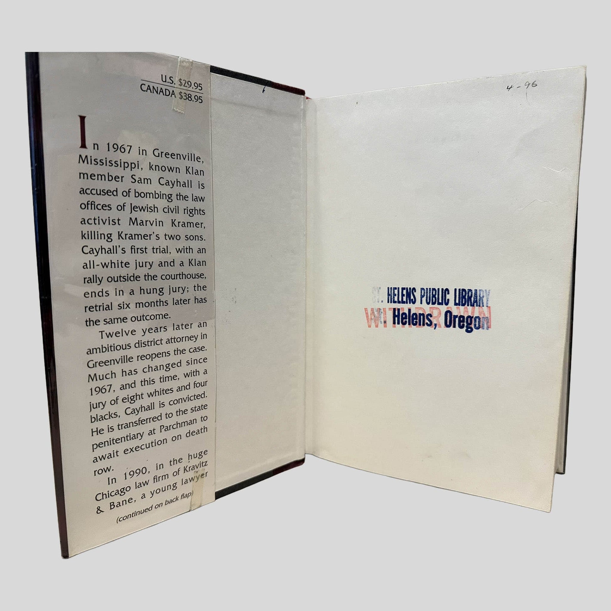Inside front cover view of The Chamber by John Grisham (Large Print Edition) centered on a neutral light gray background. The inside page has "ST HELENS PUBLIC LIBRARY" stamped in blue ink and "WITHDRAWN" stamped in red ink.