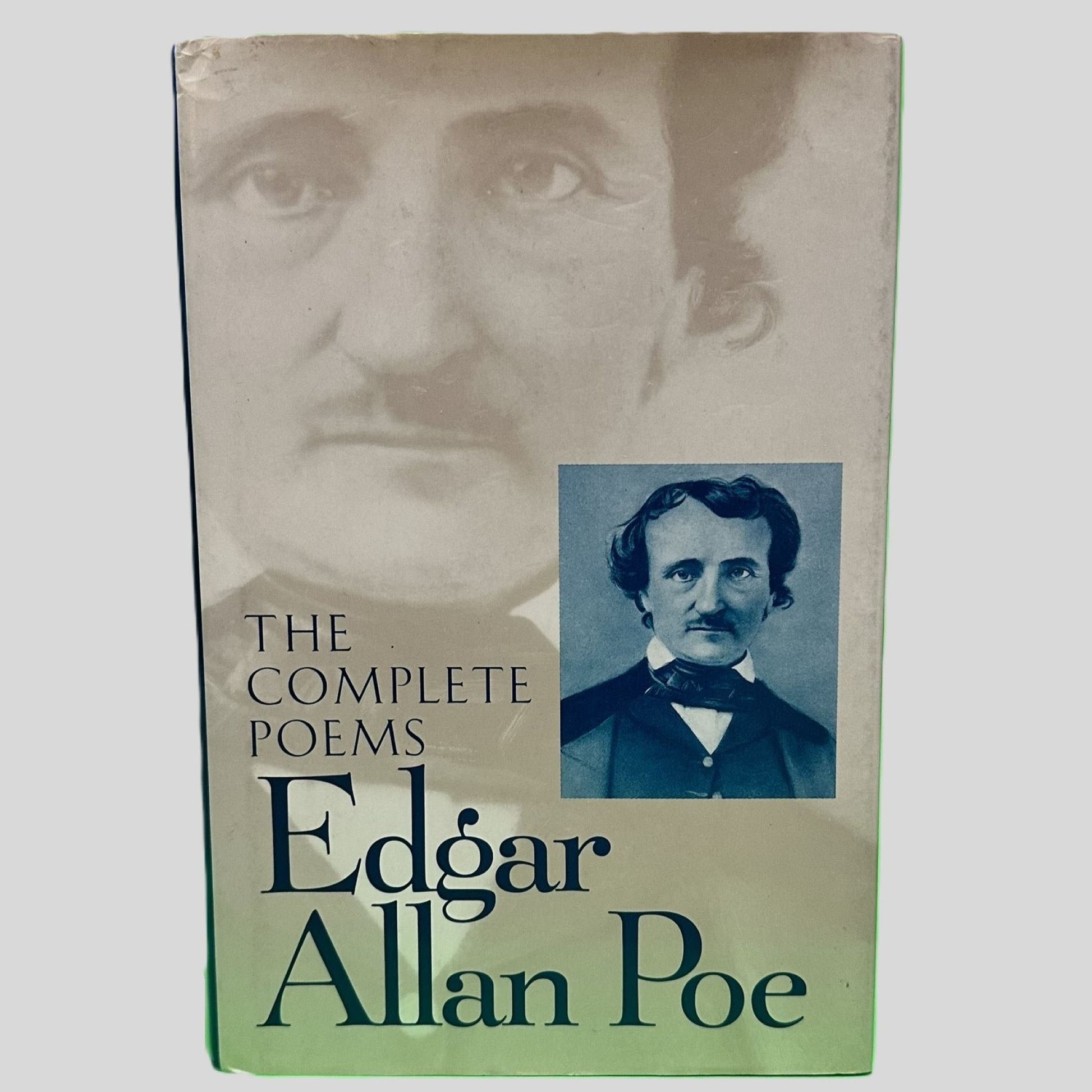 Front cover view of The Complete Poems of Edgar Allan Poe centered on a neutral light gray background. 