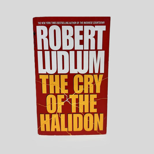 Front cover view of The Cry of the Halidon by Robert Ludlum centered on a neutral light gray background. 