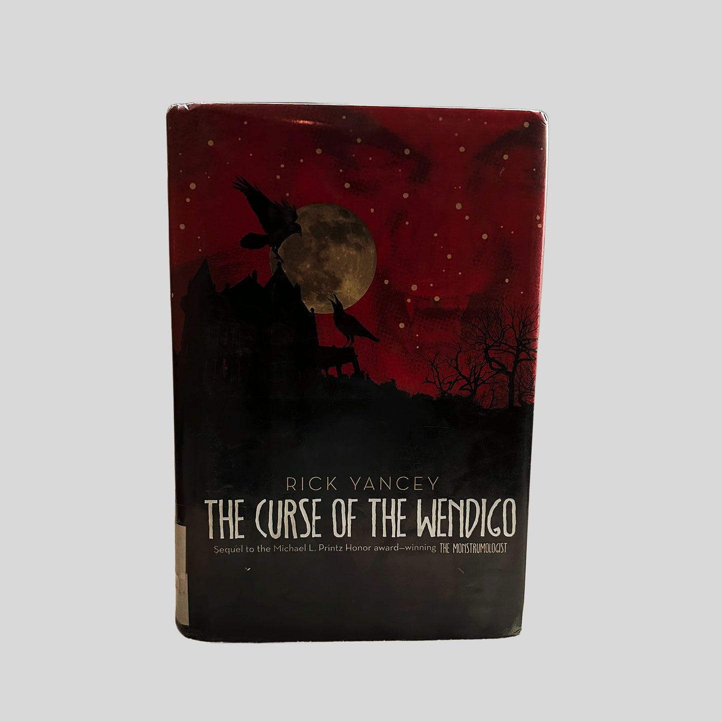 Front cover view of The Curse of the Wendigo by Rick Yancey centered on a neutral light gray background.