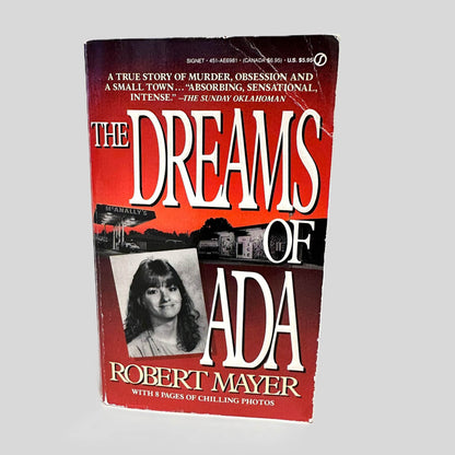 Front cover view of The Dreams of Ada by Robert Mayer centered on a neutral light gray background. Front cover shows creasing. 