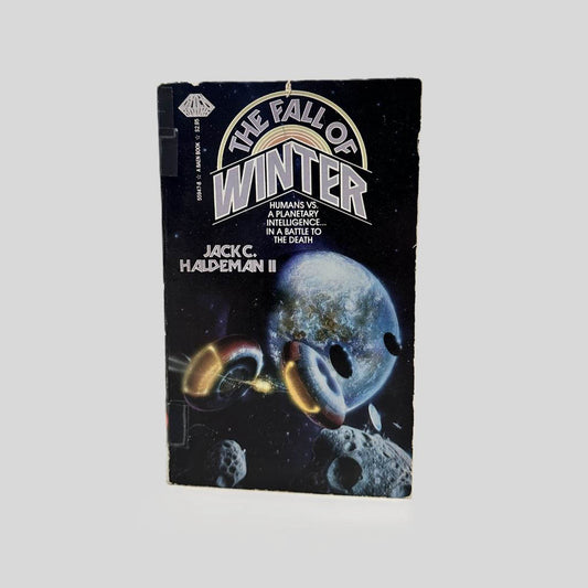 Front cover view of The Fall of Winter by Jack C. Haldeman II centered on a neutral light gray background.  Chipping is present around the edges from age and wear as a library edition.