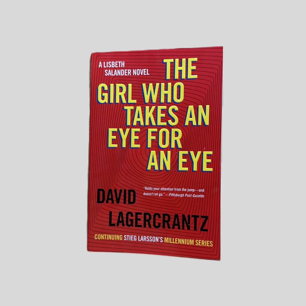 Front cover view of The Girl Who Takes an Eye for an Eye by David Lagercrantz centered on a neutral light gray background. 