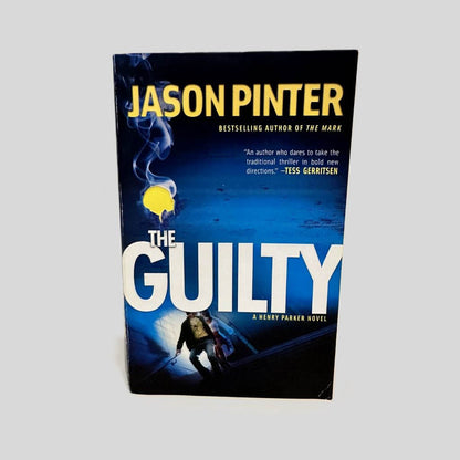 Front cover view of The Guilty by Jason Pinter centered on a neutral light gray background. 