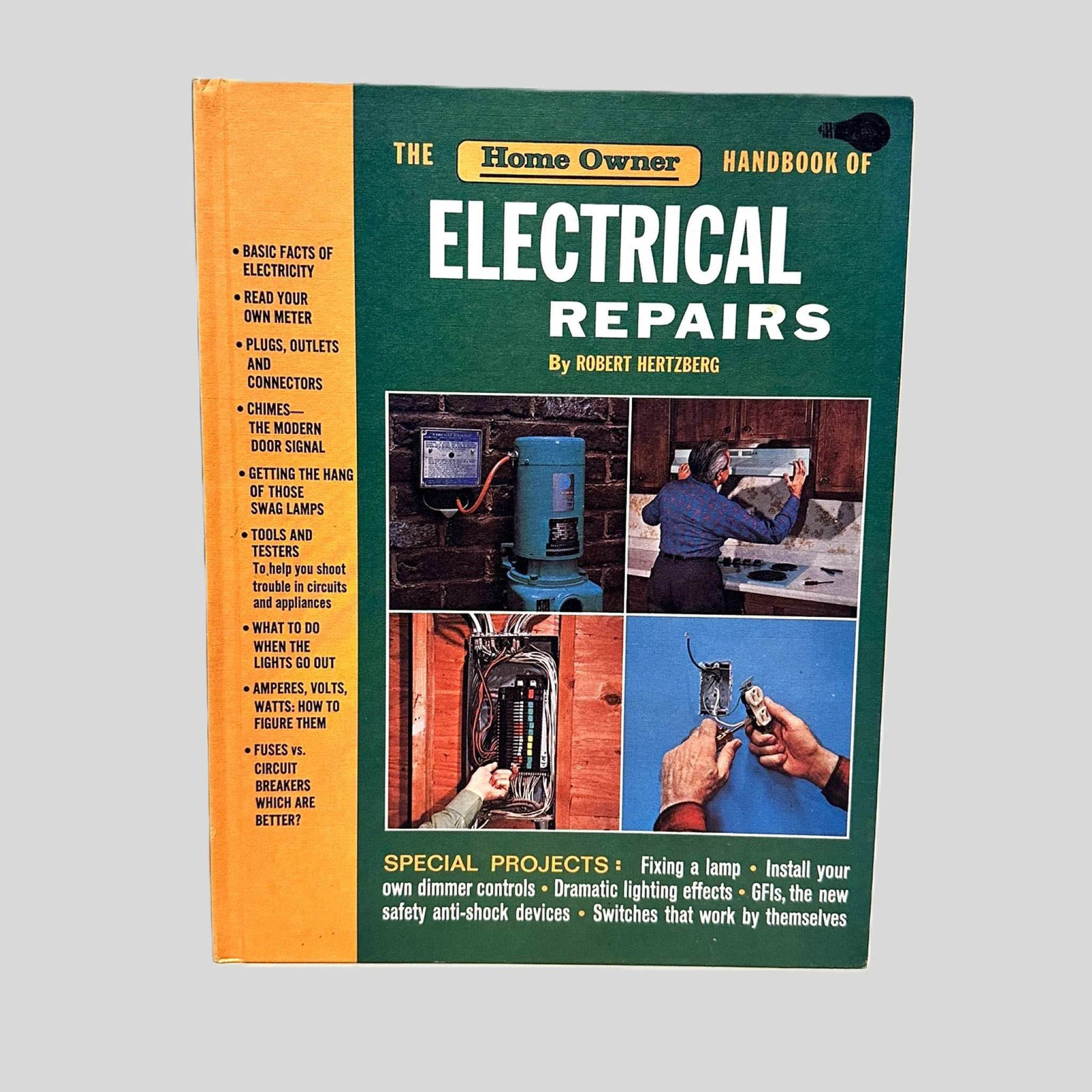 Front cover view of The Home Owner Handbook of Electrical Repairs by Robert Hertzberg centered on a neutral light gray background. Bumping in top left corner of spine.