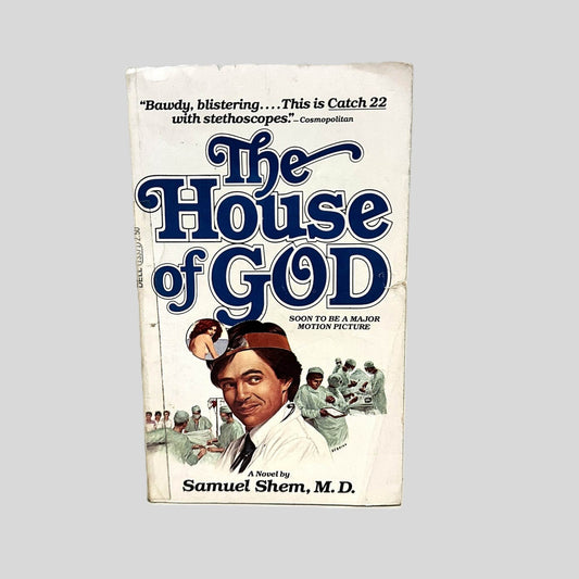 Front cover view of The House of God by Samuel Shem, M.D. centered on a neutral light gray background. Chipping and creasing are present. Transparent tape on the spine edge.