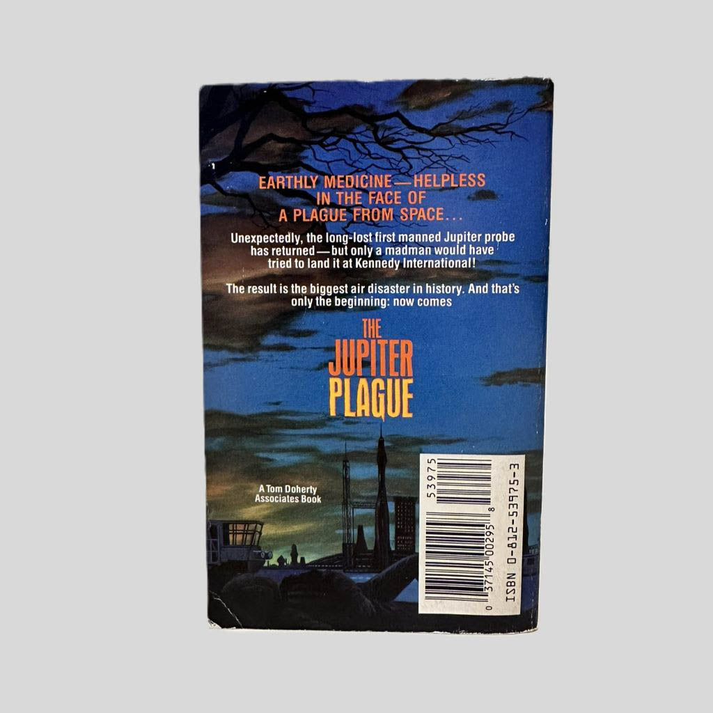 Back cover view of The Jupiter Plague by Harry Harrison centered on a neutral light gray background. Chipping around the edges. Crease along the bottom left corner.