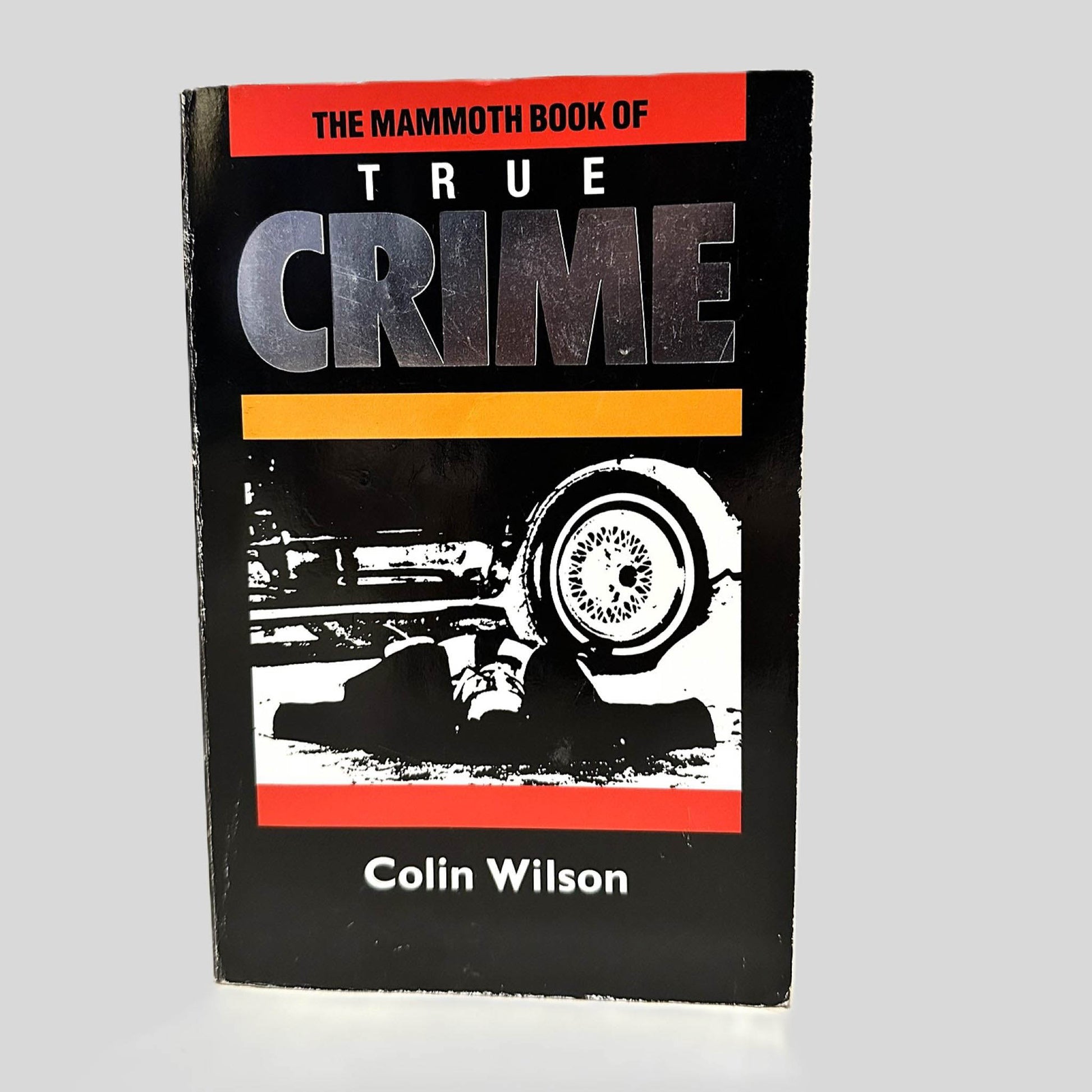Front cover view of The Mammoth Book of True Crime by Colin Wilson centered on a neutral light gray background. 