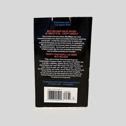 Back cover view of The Minds of Billy Milligan by Daniel Keyes centered on a neutral light gray background. 