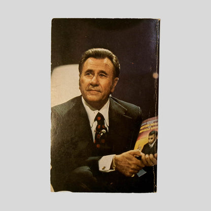 Back cover view of The Miracle Of Seed Faith by Oral Roberts centered on a neutral light gray background. Creasing near the spine edge. Normal chipping from age and wear. Colors are vibrant.