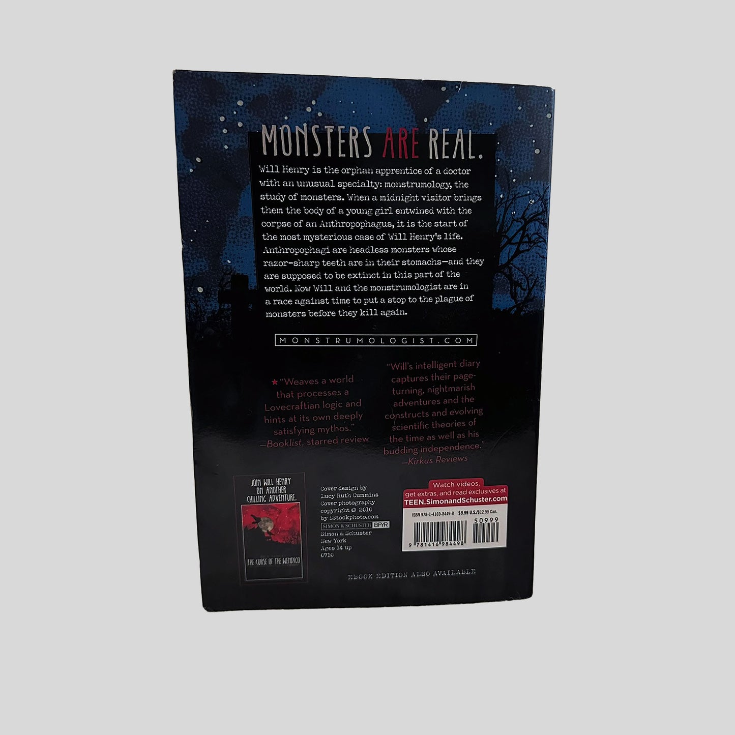Back cover view of The Monstrumologist by Rick Yancey centered on a neutral light gray background. 