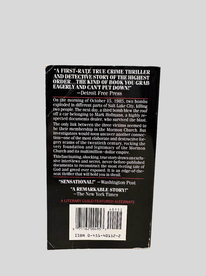 Back cover view of The Mormon Murders by Steven Naifeh & Gregory White Smith centered on a neutral light gray background. 