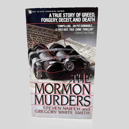 Front cover view of The Mormon Murders by Steven Naifeh & Gregory White Smith centered on a neutral light gray background.