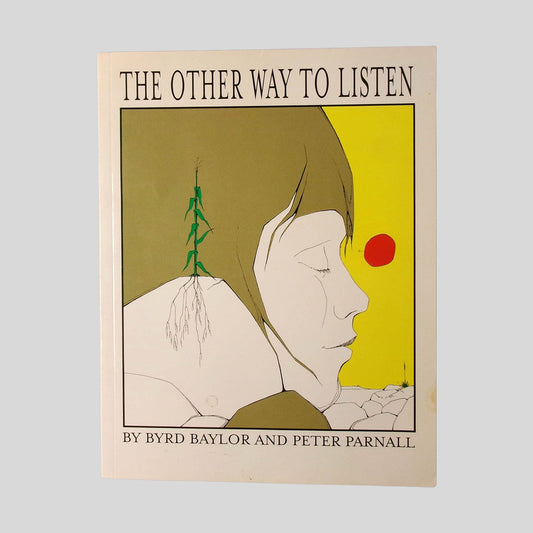 Front cover view of The Other Way To Listen by Byrd Baylor centered on a neutral light gray background. Small crease to the lower right corner. Cover art is vibrant.